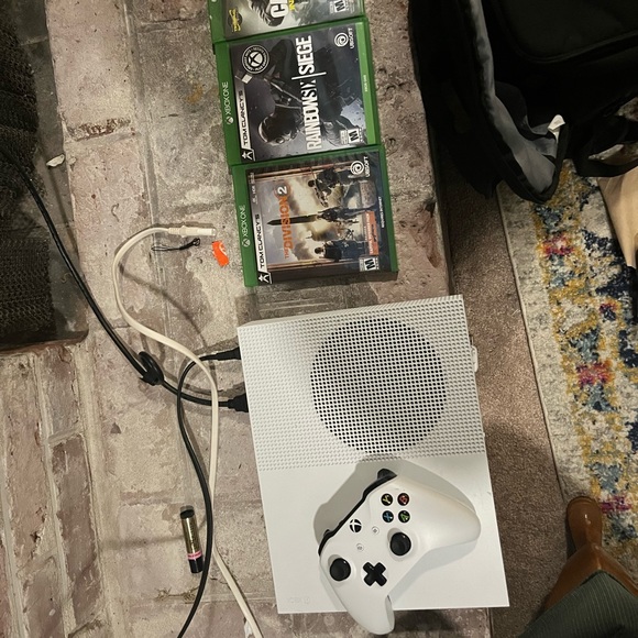 xbox 1s 1tb with 3 games, power chord, HDMI chord. not firm on price